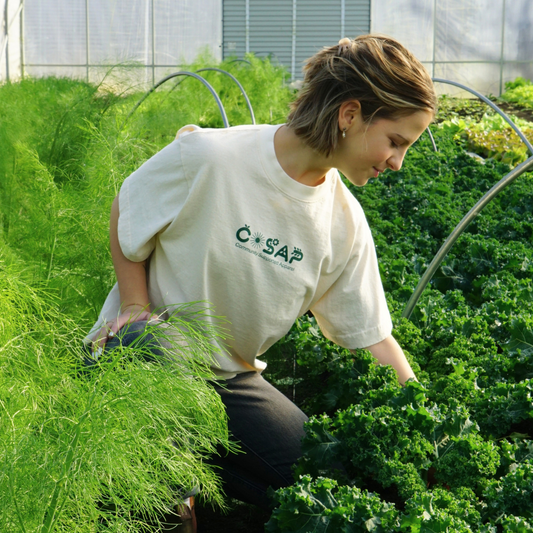 girl wearing COSAP tee, Reclaimed Cotton Tshirt, COSAP Co-op Community Supported Apparel Tee tshirt, mission based tshirt