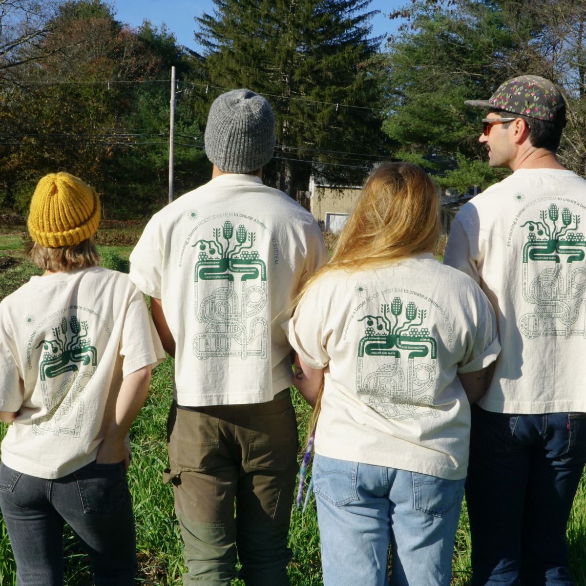 Group of people wearing COSAP tees, Reclaimed Cotton Tshirt, COSAP Co-op Community Supported Apparel Tee tshirt, mission based tshirt