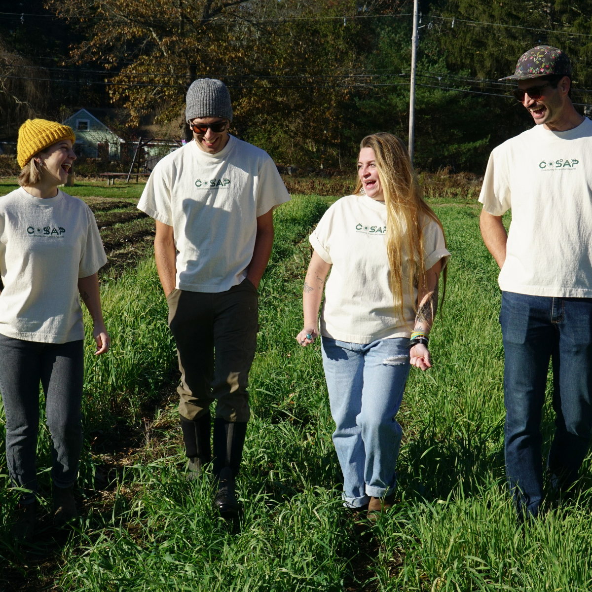 Group of people wearing COSAP tees, Reclaimed Cotton Tshirt, COSAP Co-op Community Supported Apparel Tee tshirt, mission based tshirt