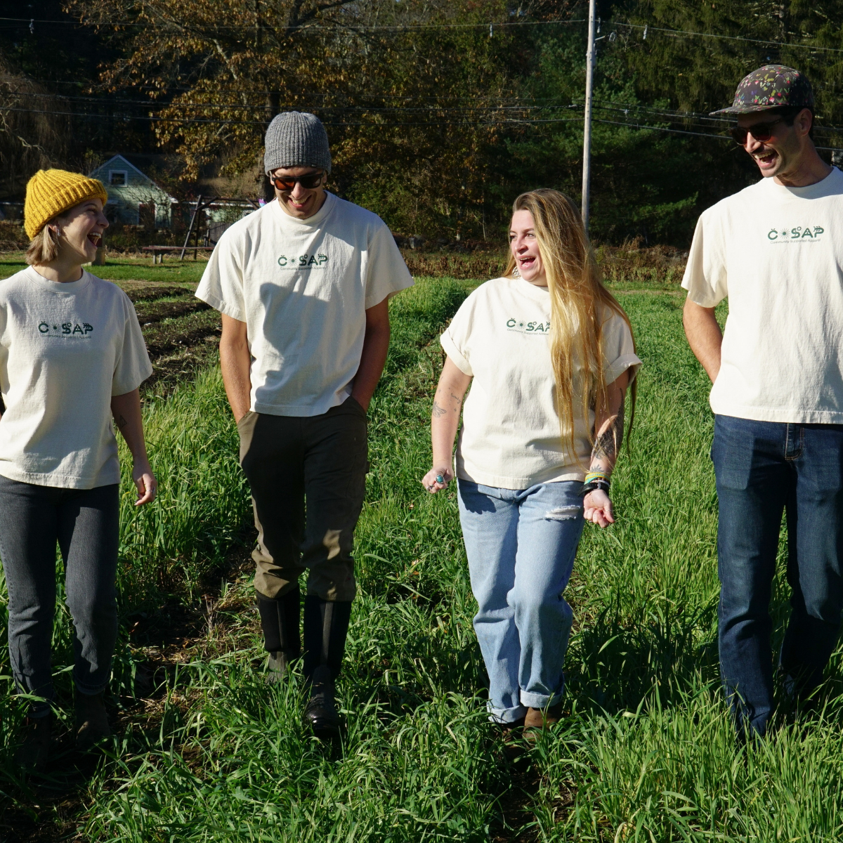 Group of people wearing COSAP tees,  Reclaimed Cotton Tshirt, COSAP Co-op Community Supported Apparel Tee tshirt, mission based tshirt